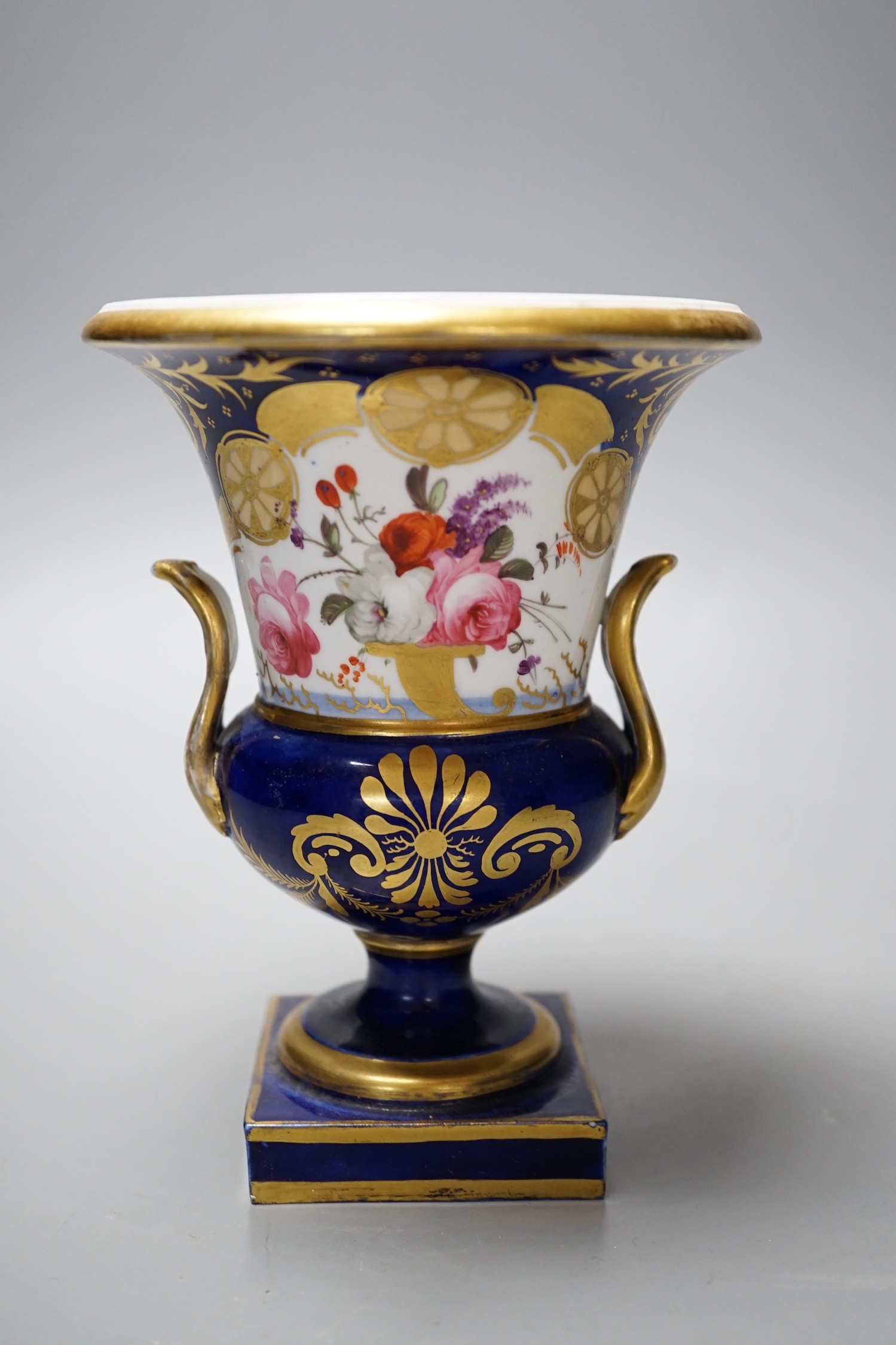 A Paris porcelain two-handled vase urn, with floral decoration, 16cm tall